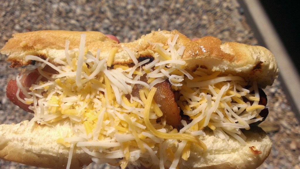 bacon-wrapped-hot-dog-shredded-cheese