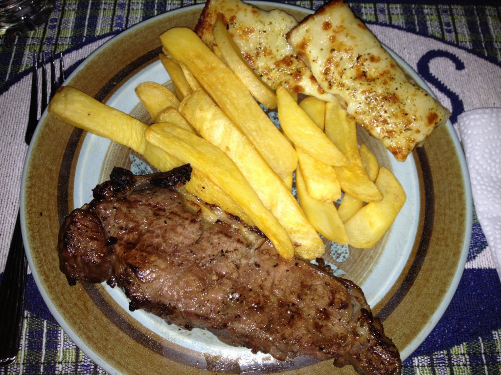 dinner-steak-french-fries-little-caesars-cheese-bread